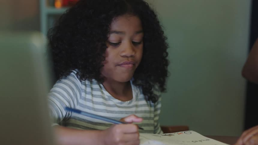 Child drawing with parent