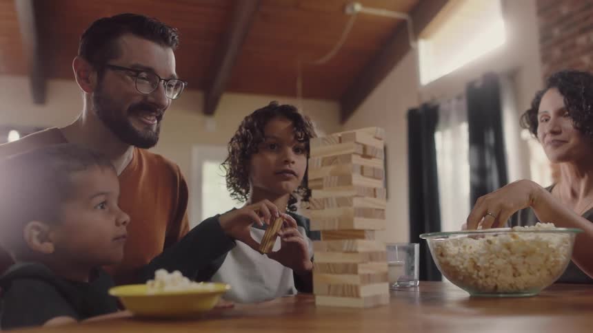 Family playing jenga