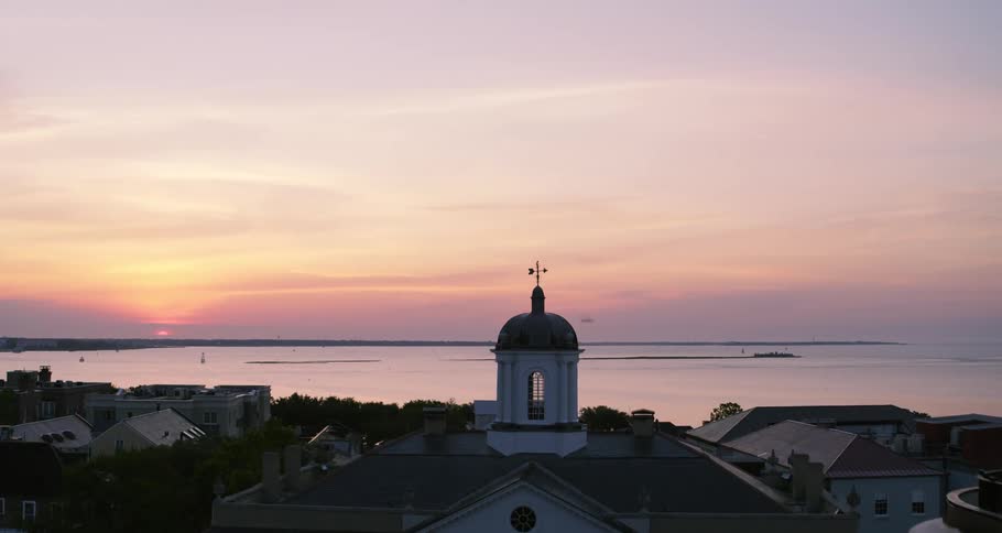 A town is on the coast of a large body of water