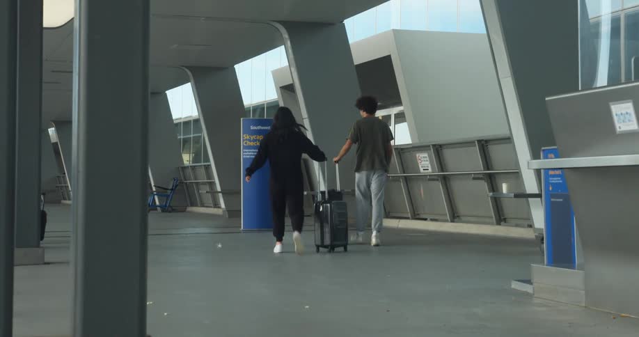 People pulling suitcases