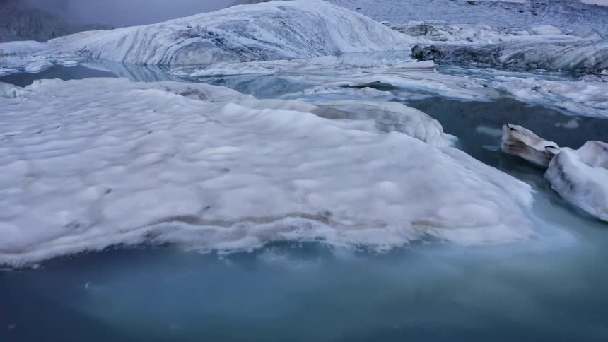 The water is lined with ice