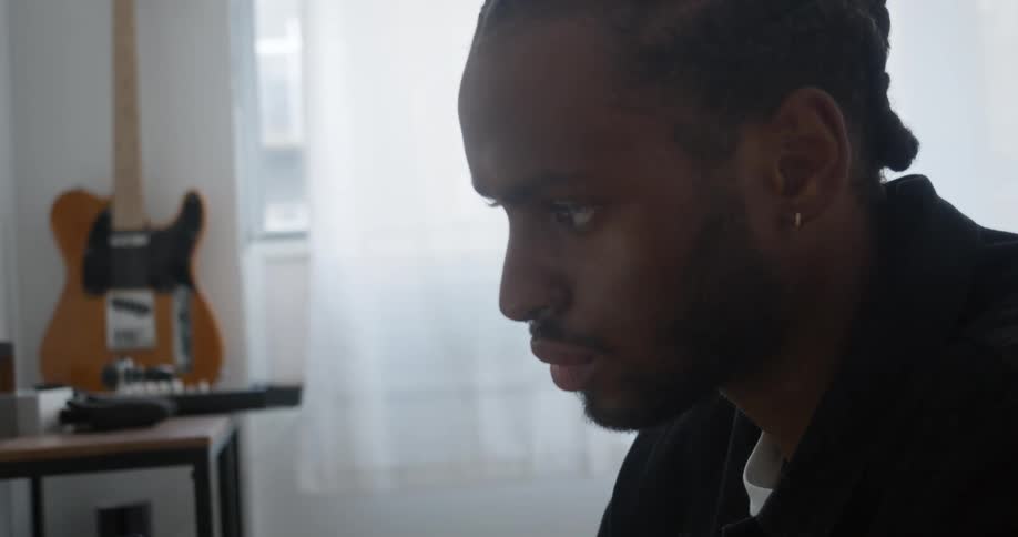 A man is looking forward at something