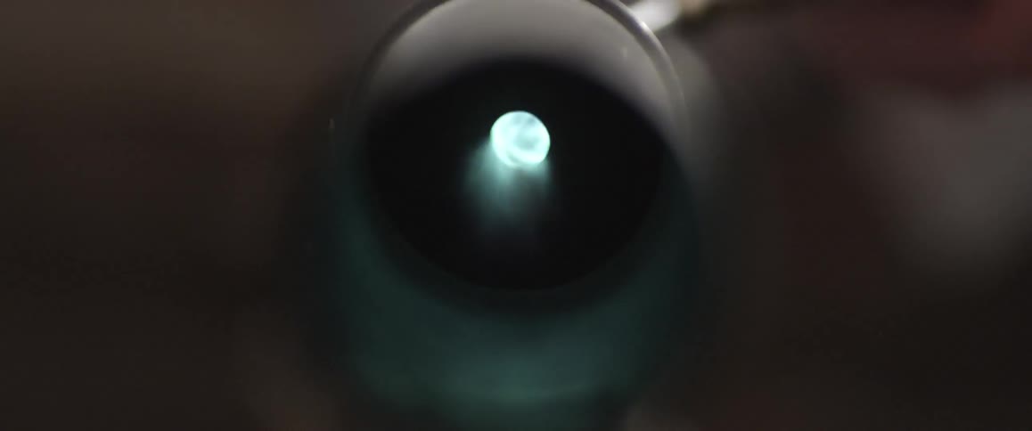 Fire shoots through a small tube