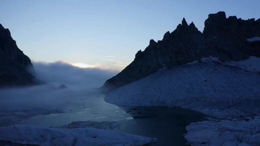 The water is frozen on the mountain range