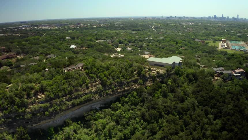 An aerial view of a neighborhood on a hill