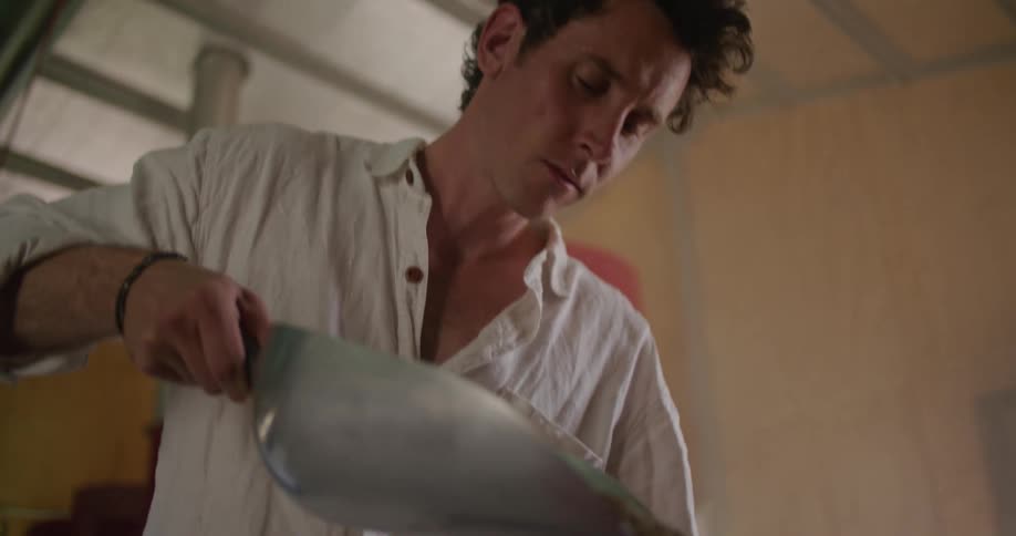 Person pouring from scoop