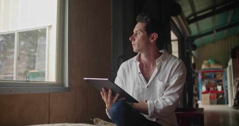 Person typing on tablet