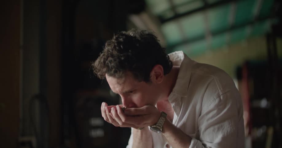 Person smelling coffee beans
