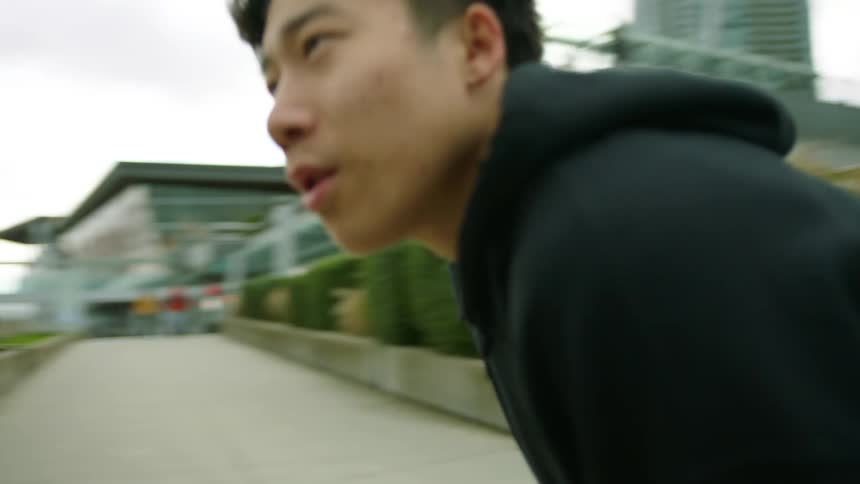 A man gets up from a rest and runs off