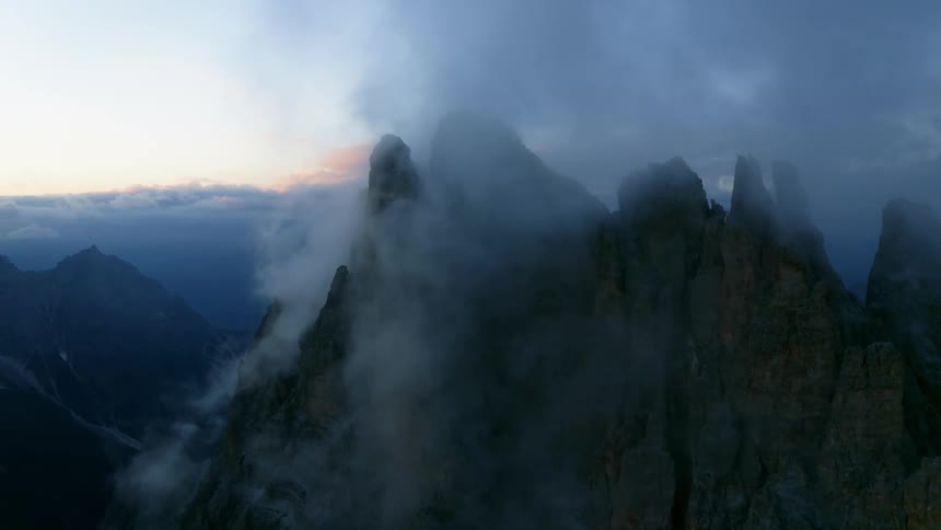 Mountains with peaks high in the clouds