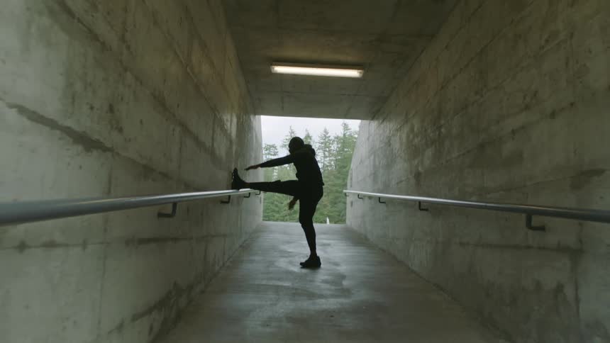 A man stretching outdoors