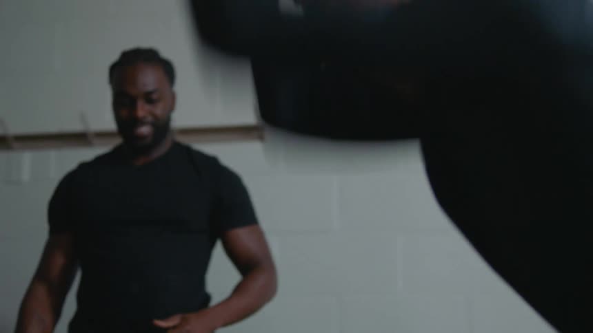 Two men working out in a room