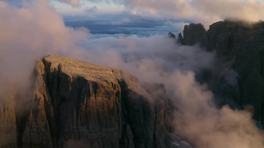 Mountains high in a cloudy sky