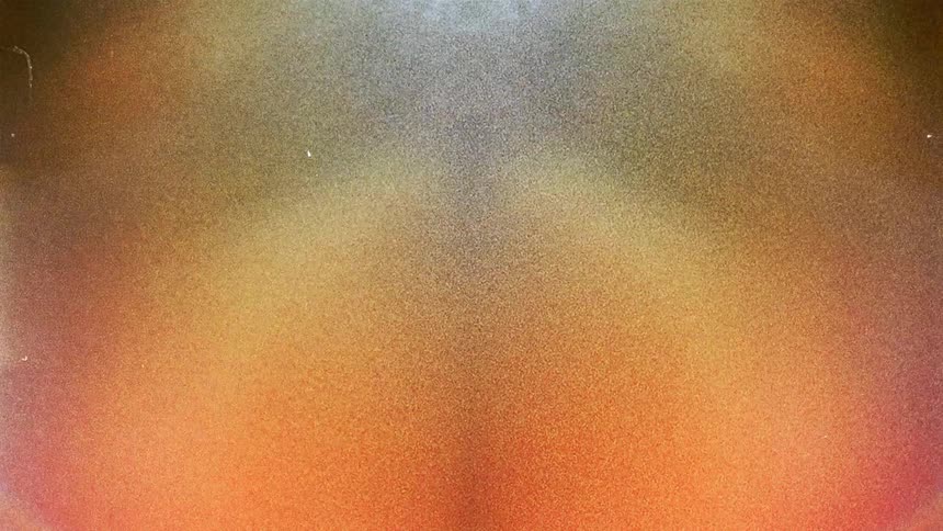 Abstract moving colorful shapes caught on vintage film