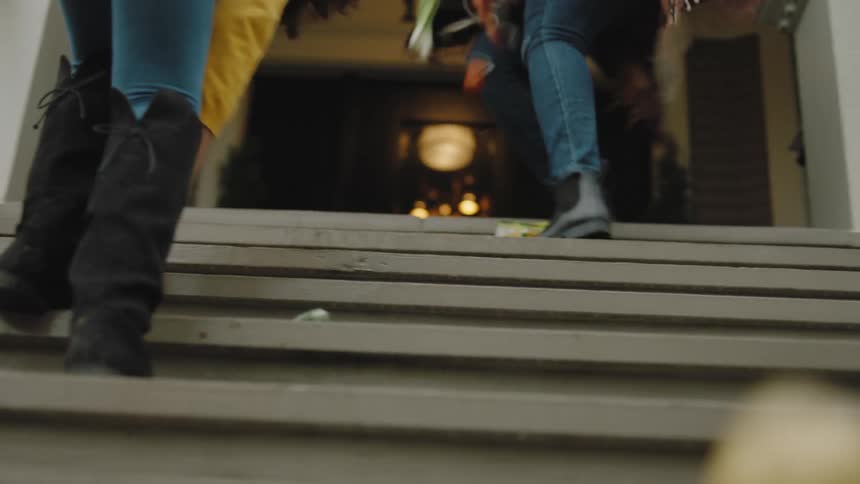 Females dropping food on steps