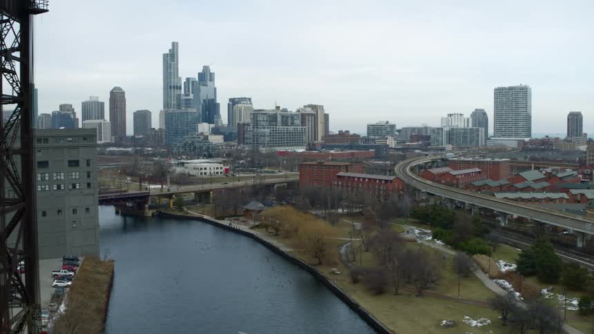A river running through a metropolis during the day