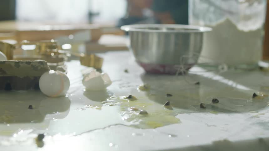 Dirty kitchen countertop at home filled with food waste after cooking