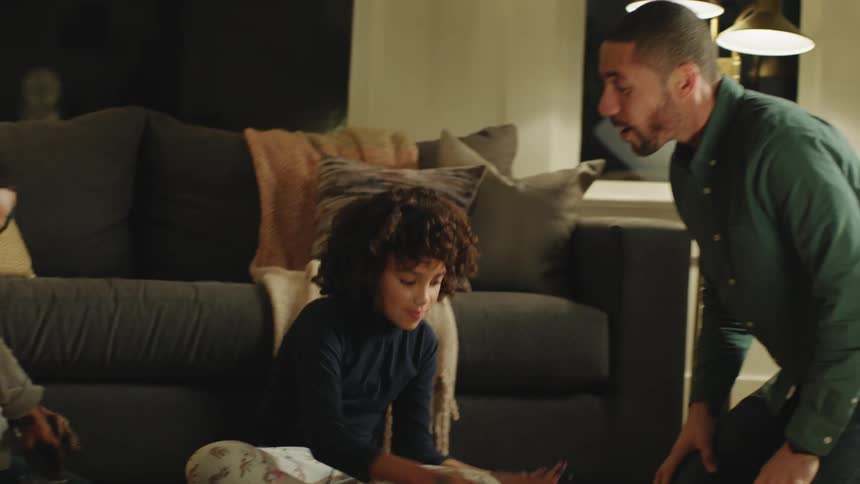 A family playing with paint together