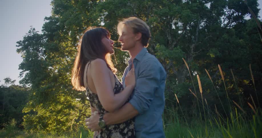People kissing outdoors