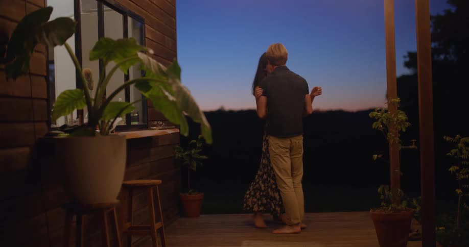 Couple dancing under canopy