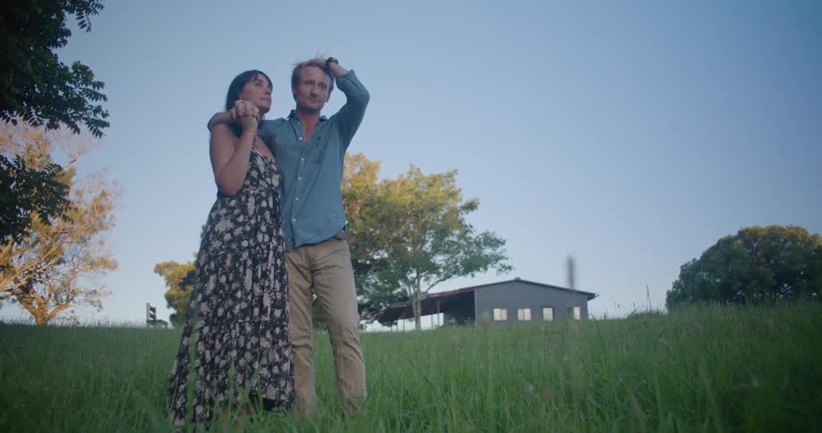 Couple standing outdoors