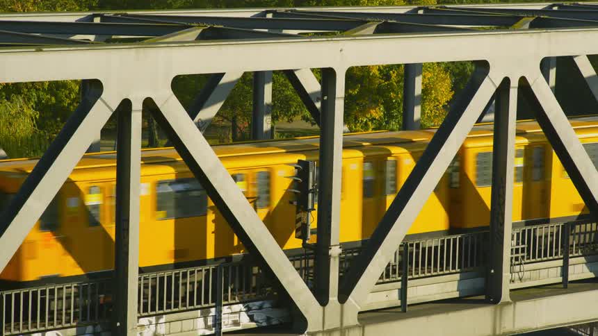 A train travels over the bridge