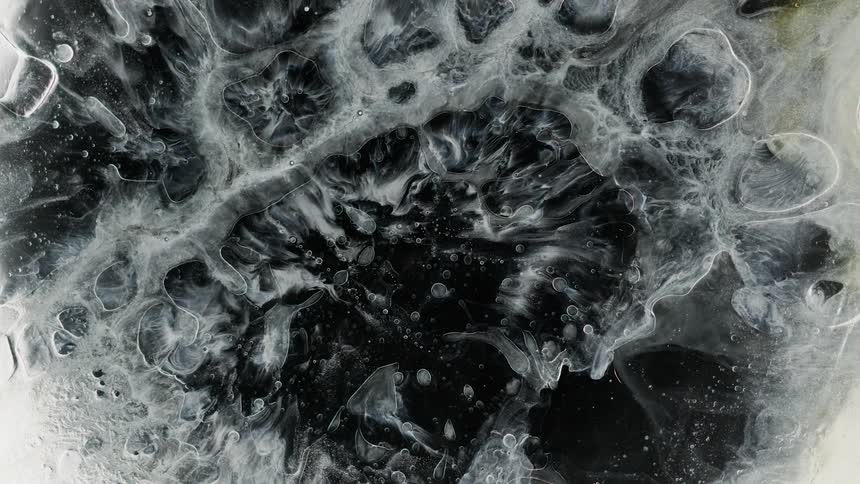 Water and bubbles flow under icy surface