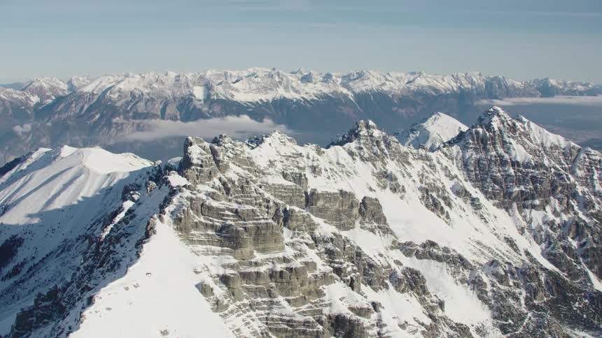 Aerial view of snowy mountain tops