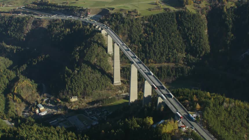 An aerial view of a bridge over a canyon