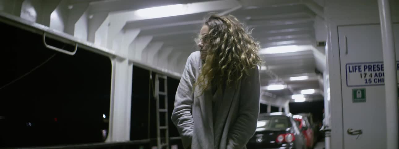 A woman's hair blows in the wind