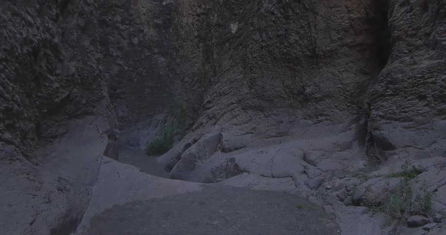 Canyon walls tower overhead