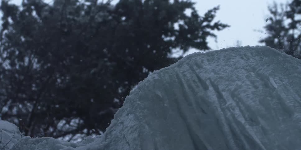 The ice is chipping at the top of this ledge