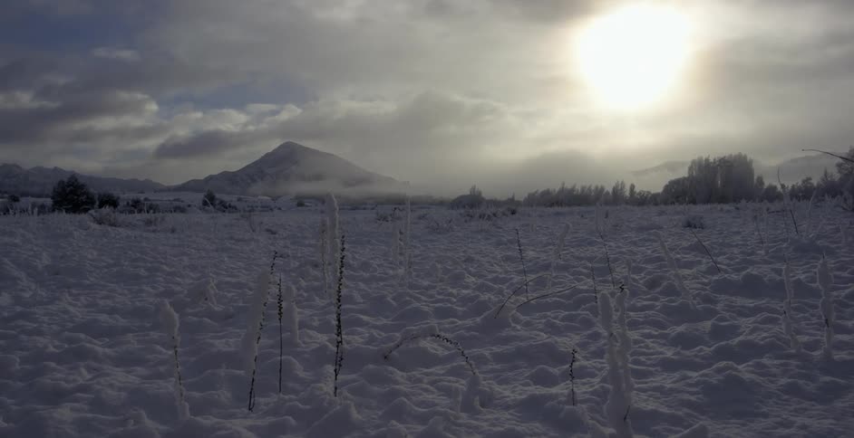 A open plain covered in deep snow