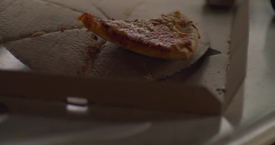 Slice of pizza in box