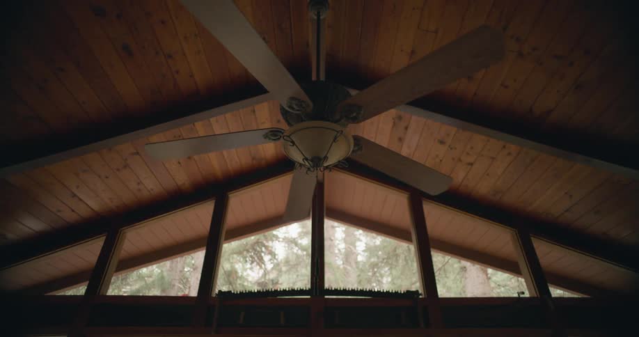 A ceiling fan is turning slowly