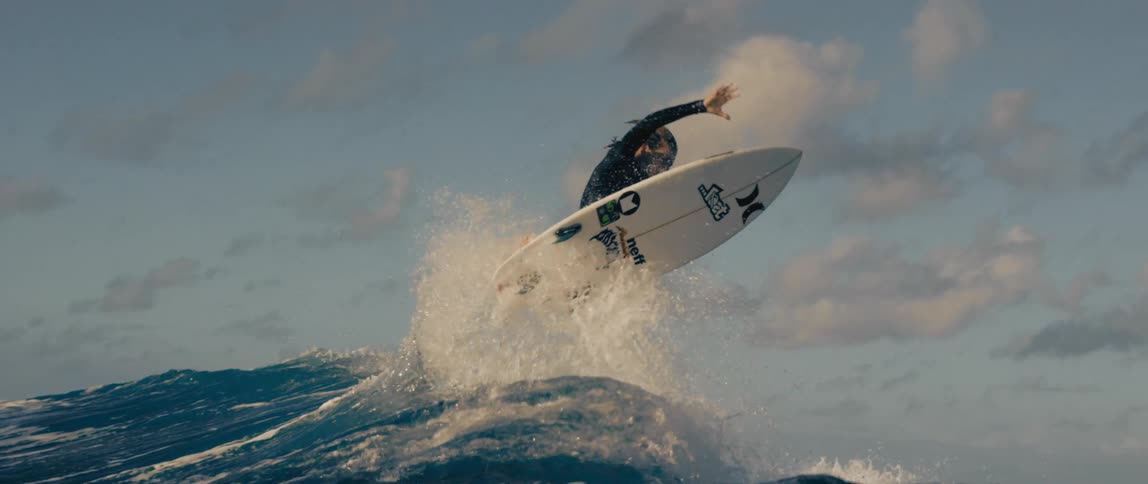 A person surfing on a large wave