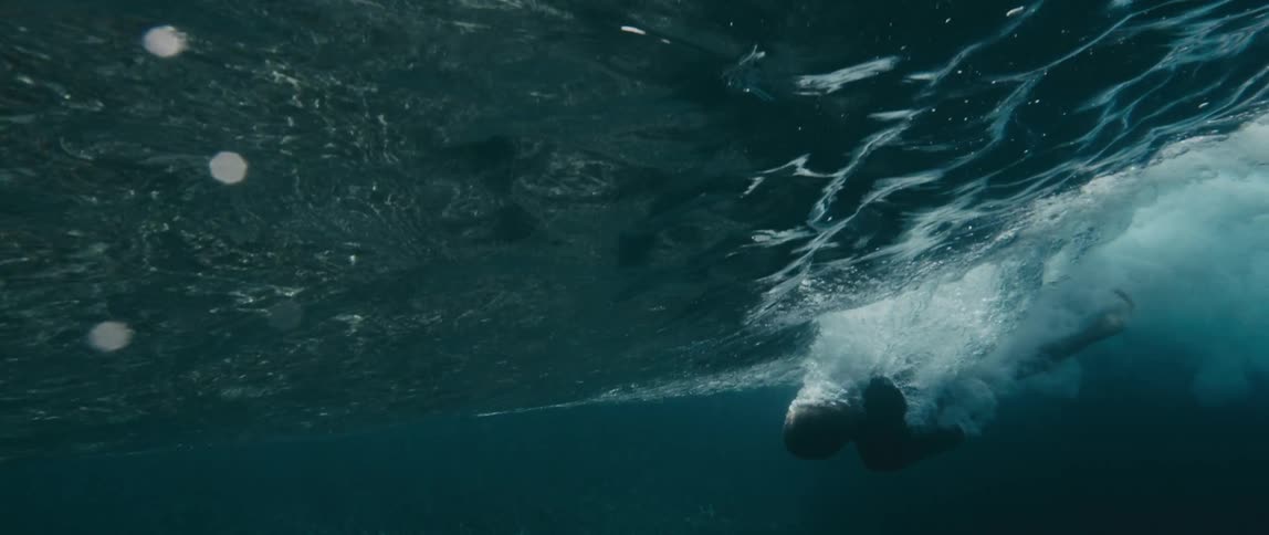 Person diving into water