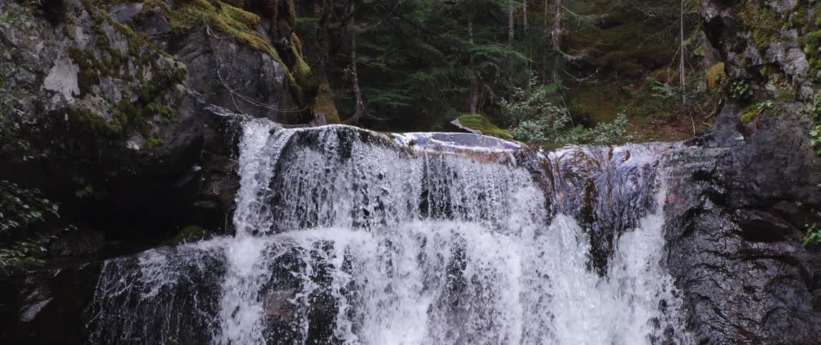 Water is flowing through the waterfall