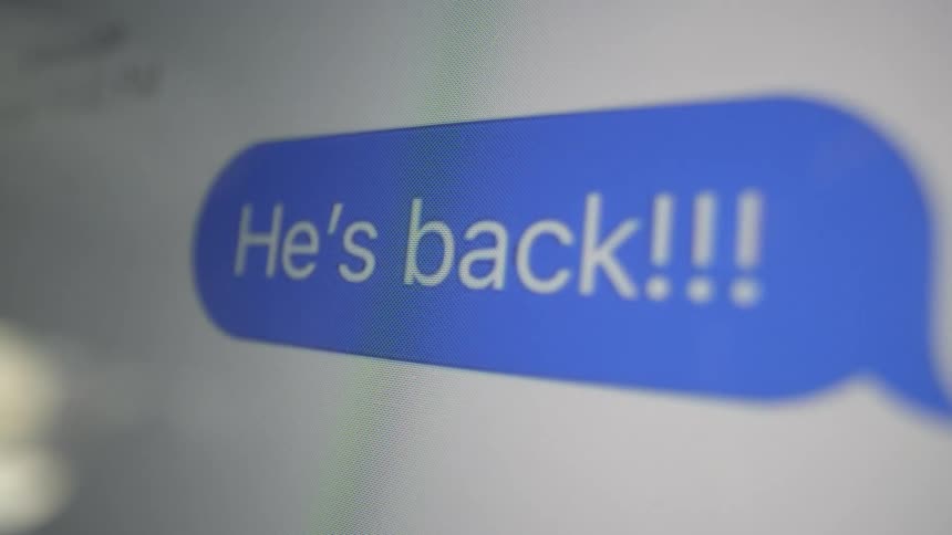 Close up of a text message being sent on cell phone