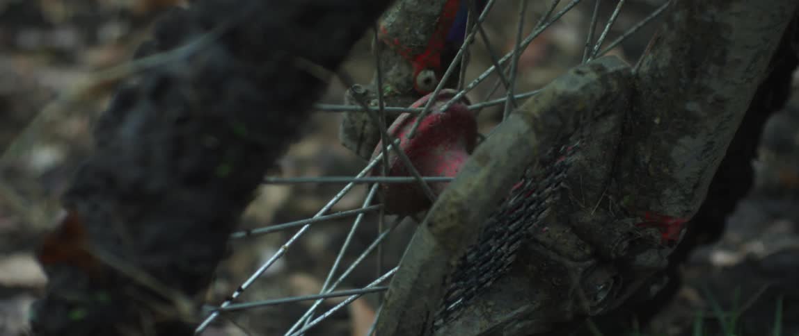 A muddy tire on a dirt bike