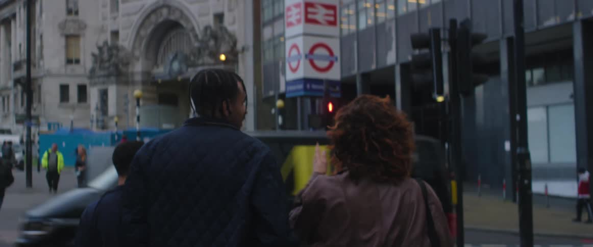 People waiting to cross the road