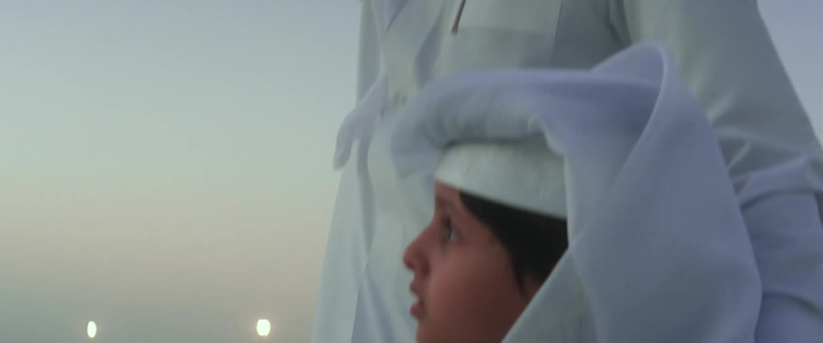 A father and son standing outdoors