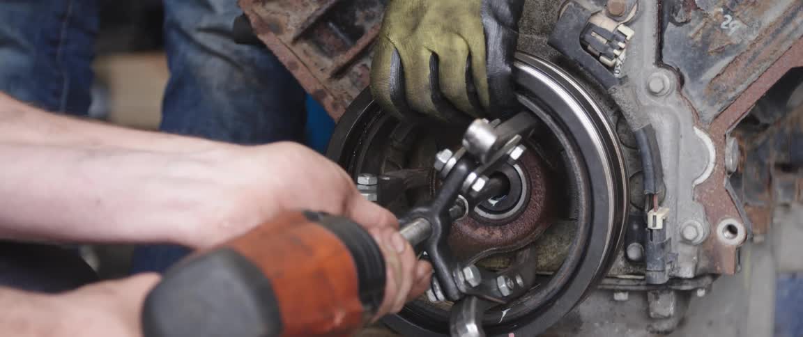 People working on a machine