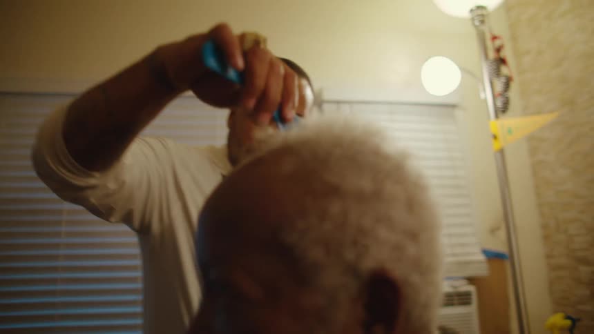 Man receiving haircut