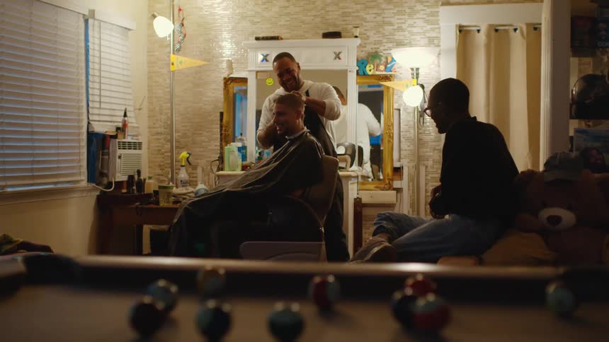 A view of people at a barbers shop