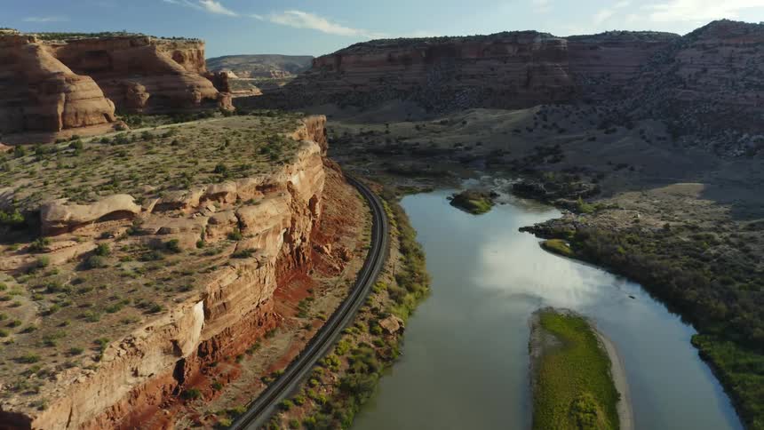 A river is flowing through the valley in spring