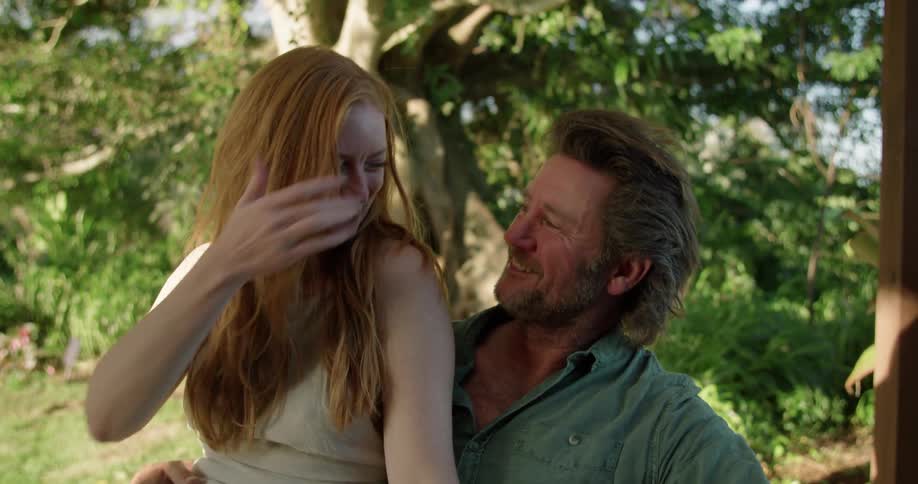 Husband and wife are showing affection outdoors in spring