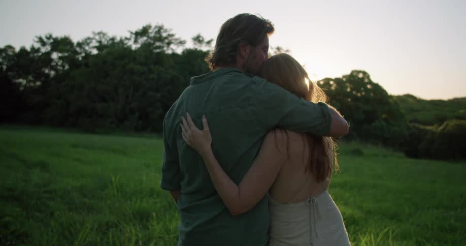 Couple hugging outdoors