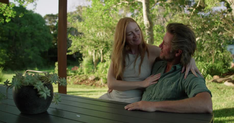 People kissing outdoors