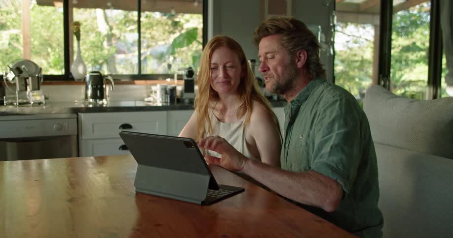 Couple looking at tablet